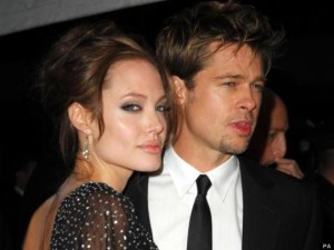 Actress Angelina Jolie and Brad Pitt attend the World Premiere of "The Good Shepherd" presented by Universal Pictures held at the Ziegfeld Theatre on Monday, December 11, 2006, New York City, New York.