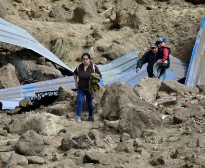 Death toll in Ecuador landslide rises to 14, dozens missing